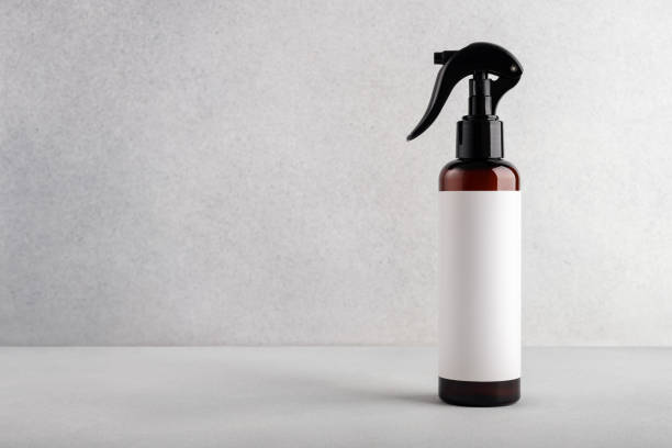 istock Brown cosmetic trigger sprayer bottle with blank labels 2178059074