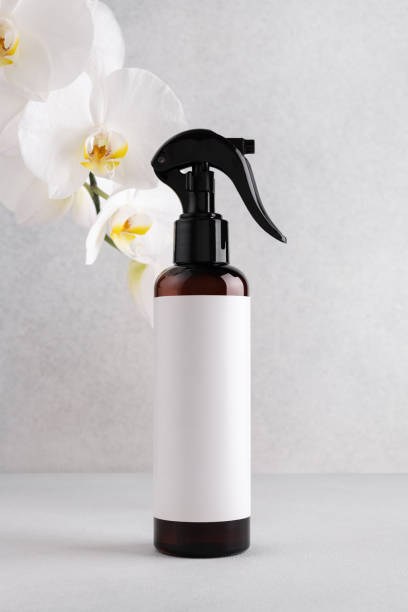 istock Brown cosmetic trigger sprayer bottle with blank labels mockup. 2178059077