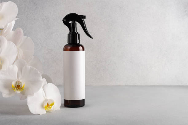 istock Brown cosmetic trigger sprayer bottle with blank labels mockup 2178059193