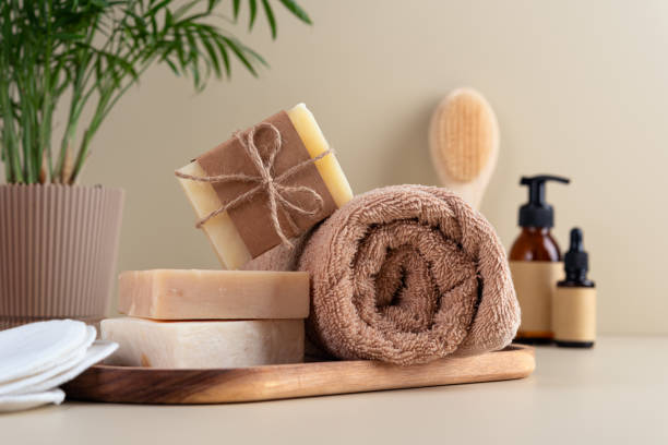istock Natural handmade soap bars and fluffy towel in bathroom 2178059252