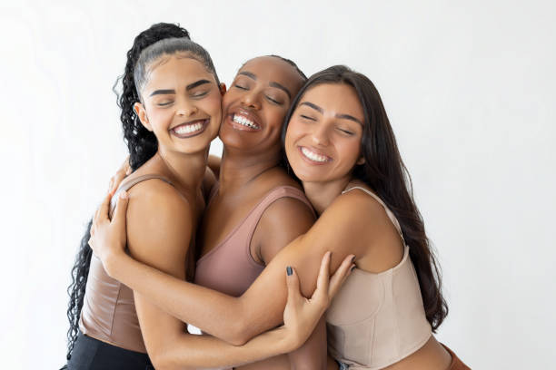istock Three Brazilian women smiling with eyes closed 2178071416