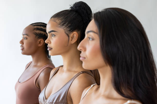 istock Side view portrait of three beautiful women 2178071753