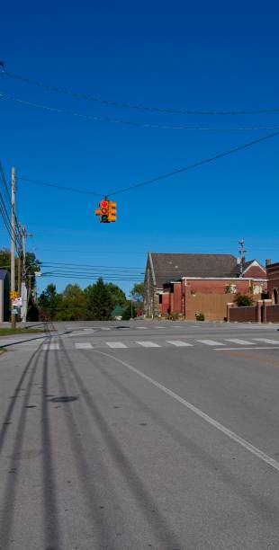 istock Crossroads in a small town with a traffic light 2178074035