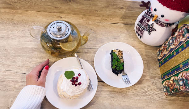 istock cakes and tea on the windowsill, Christmas decor 2178075527