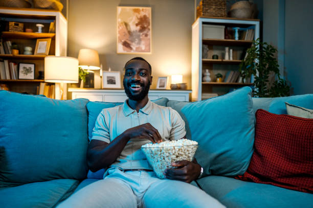 istock Man watching a movie at home 2178076149