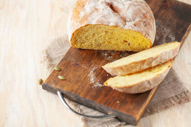 istock Fresh cornbread and corn grains on the table. Food grain crisis concept 2178078225