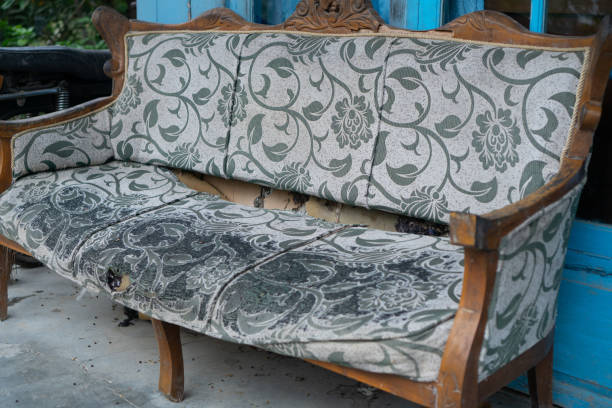 istock sofa chairs that have been damaged due to age 2178078786