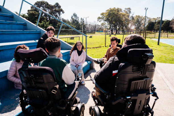 istock Friends talking in a public park 2178082737