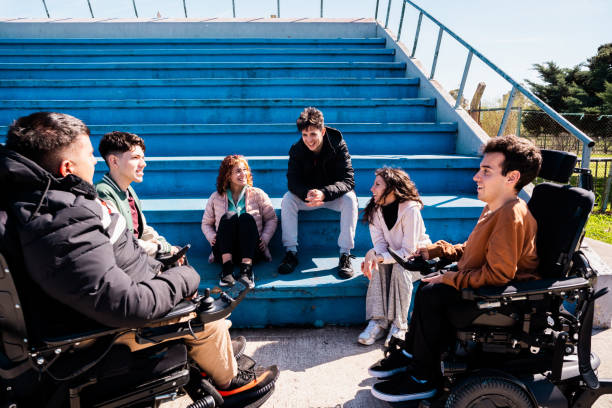 istock Friends talking in a public park 2178082745
