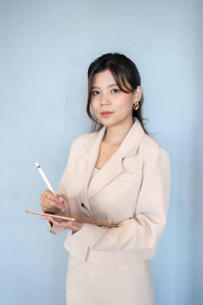 istock As a leader, the Asian female executive emphasizes collaboration and open communication, creating a business environment where every team member feels valued and empowered to contribute ideas. 2178090380