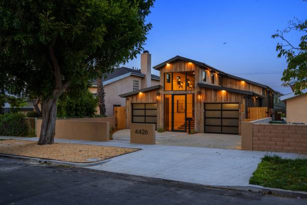 istock Modern suburban house with elegant lighting at dusk. 2178091261