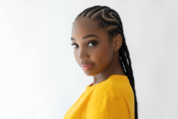 istock African woman looking sideways to camera 2178092960