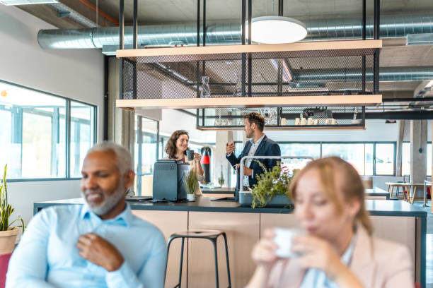 istock Mid Adult Business Colleagues in a Modern Workspace 2178095944