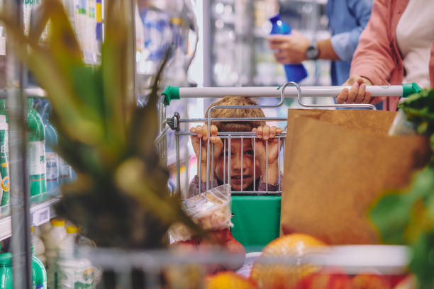 istock Young Boy Portrait In Market 2178097053