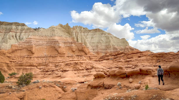 Woman Hiking Through Unique Red Rock Formations at Kodachrome Basin State Park