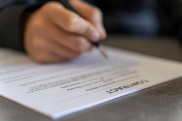 istock A woman who signed a contract. 2178111813
