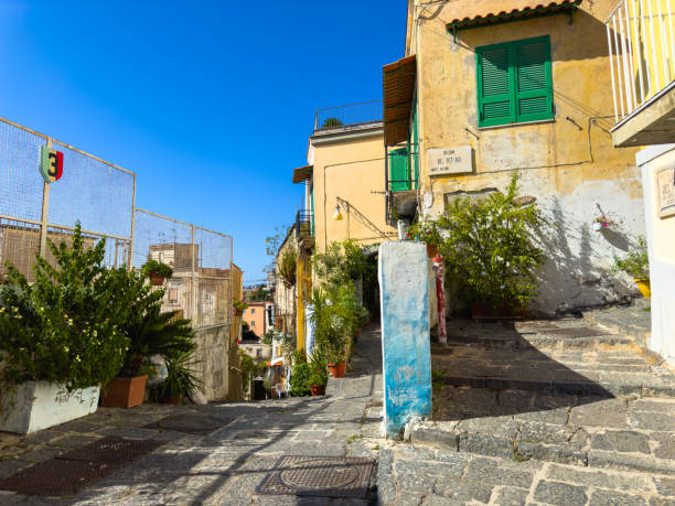 Blue Piaggio Ape car parked in the street of Stromboli island, Aeolian islands, Tyrrhenian Sea, Sicily, South of Italy, Italy, Mediterranean sea, Europe