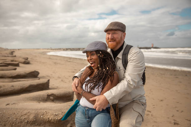 istock A senior diverse couple on a date during a wintry beach getaway 2178122359