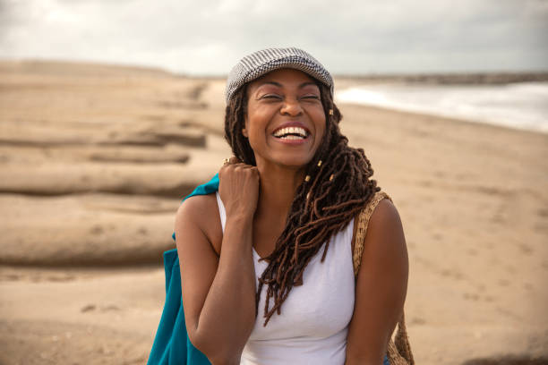 istock A senior black woman on a wintry beach getaway for mental well being therapy 2178122462