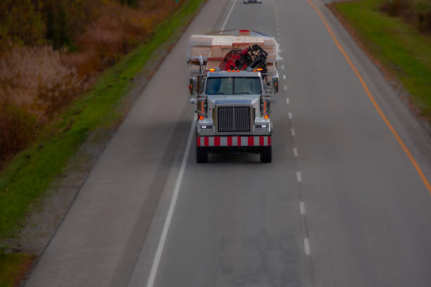 Heavy truck on a Canadian highway in the fall in Quebec