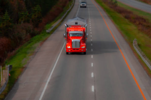 Heavy truck on a Canadian highway in the fall in Quebec