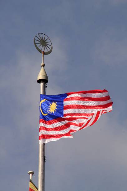 istock Malaysian flag waving against a clear blue sky. 2178127068