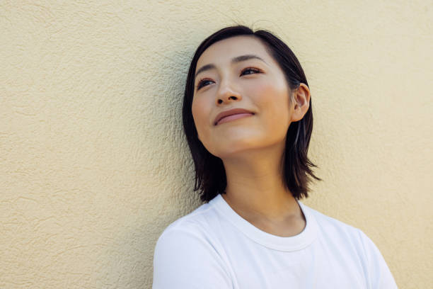 istock Woman Smiling Joyfully in a Close-Up Portrait 2178129665