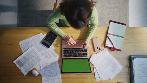 istock Lady ceo typing greenscreen laptop at table closeup. Woman texting pc top view 2178132701