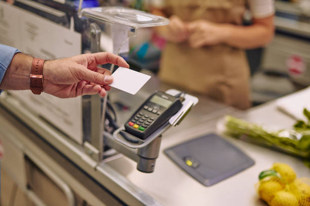istock A customer paying at checkout in supermarket 2178134570