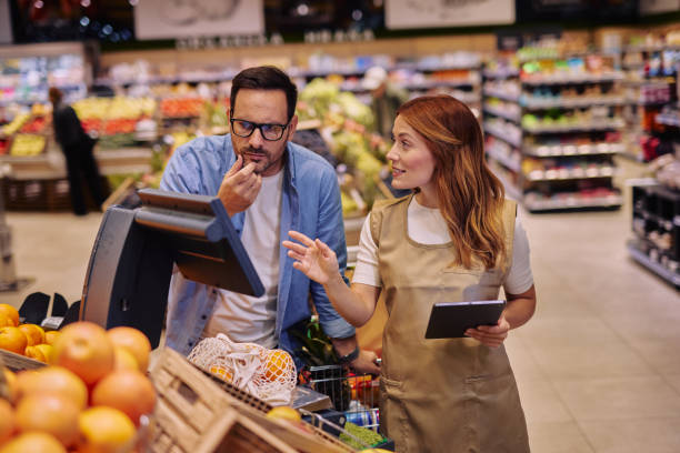 istock Customer Consulting with Employee in a Supermarket 2178135660