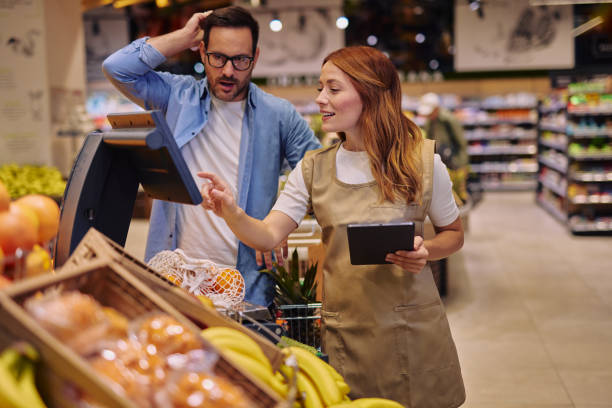 istock Customer Consulting with Employee in a Supermarket 2178135661