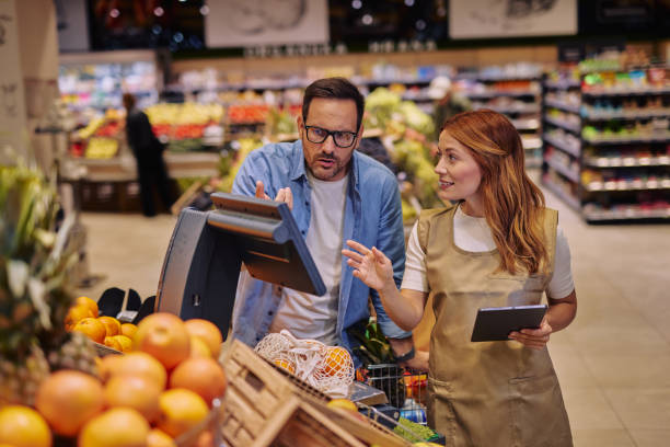 istock Customer Consulting with Employee in a Supermarket 2178135681