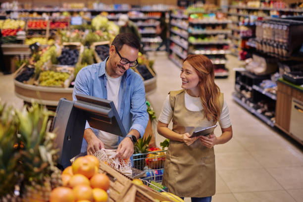istock Customer Consulting with Employee in a Supermarket 2178135692