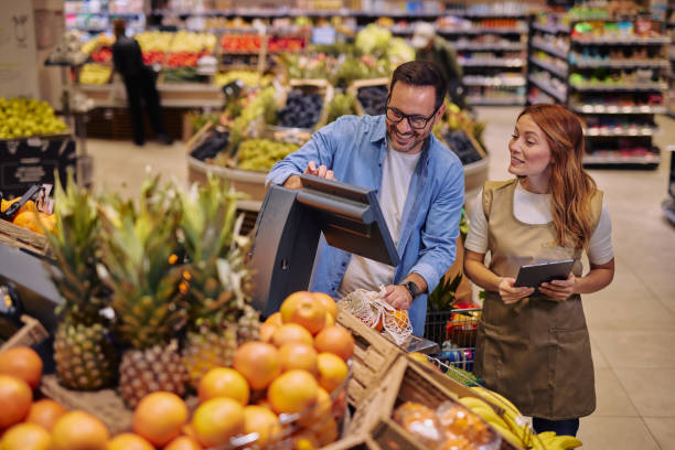istock Customer Consulting with Employee in a Supermarket 2178135693