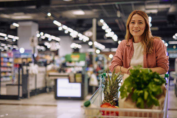 istock Woman Looking at Camera in Supermarket 2178135784