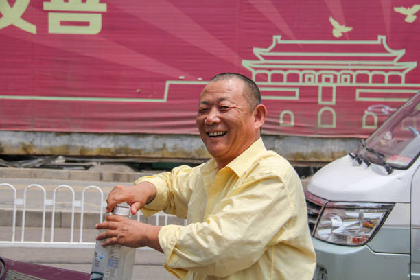 China  Beijing, Summer palace chinese male tourist happy