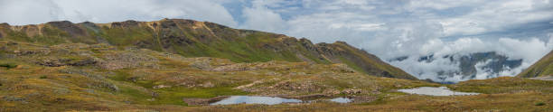 istock mountain tundra ponds with low clouds and overcast skies 2178137153