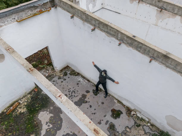 istock Apocalypse, man wearing gas mask at destroyed building 2178137230