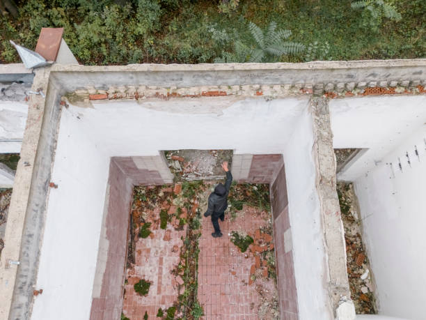 istock Apocalypse, man wearing gas mask at destroyed building 2178137247