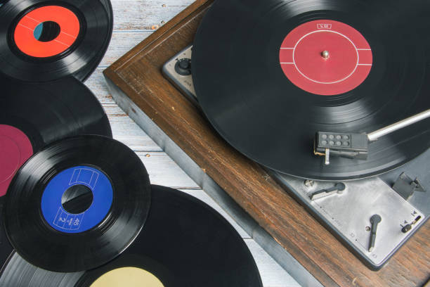 istock Old record player next to several vinyl records 2178144804