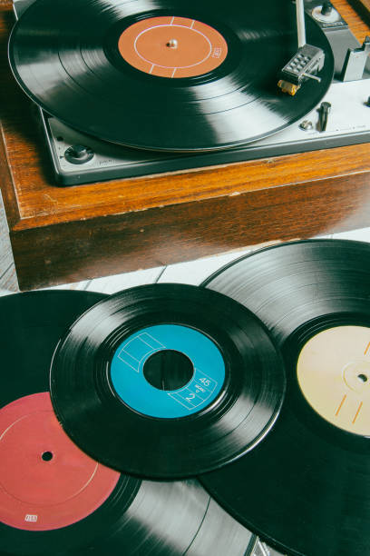 istock Old record player next to several vinyl records 2178144805