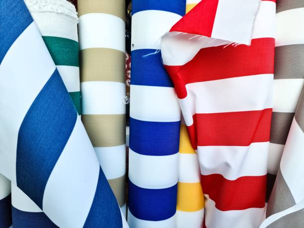 istock Detailed close up view on samples of cloth and fabrics in different colors found at a fabrics market 2178146698