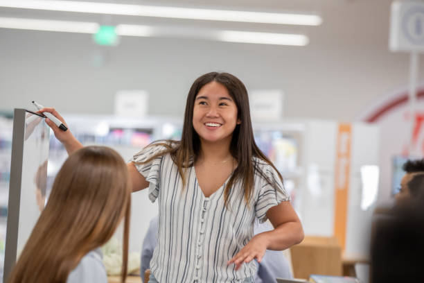 istock A college student takes charge of a study group in the library or a study space at the university 2178147567