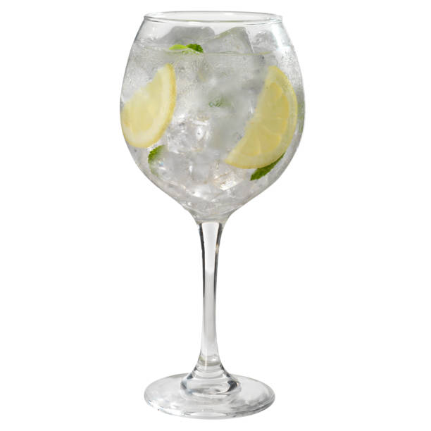 istock glass of white wine in studio with reflection on the table 2178148428