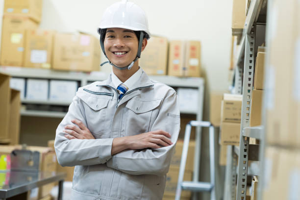 istock A man managing luggage in a warehouse 2178153118