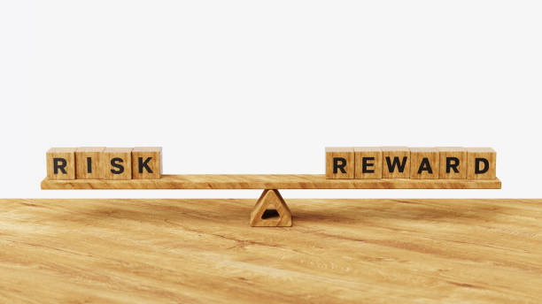 istock Risk vs Reward concept. ROI, Return on investment concept. Risk taking, financial literacy, marketing cost, funds parking, profit and loss or financial goals. 3D risk vs reward on balance scale 2178153247