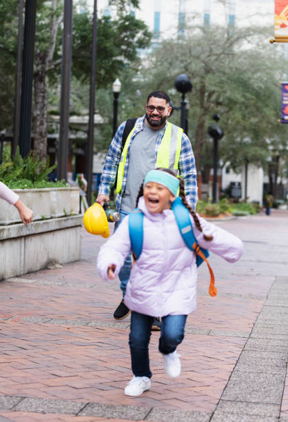 istock Construction worker father takes daughter to school 2178155883