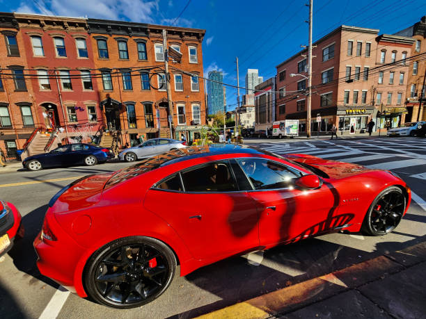 New York City, USA - October 24, 2023: Fisker Karma Revero red sport car, top side view.