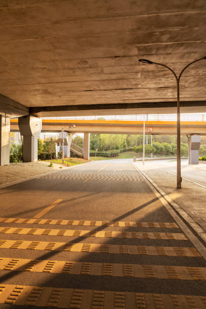 istock Concrete structure and asphalt road space under the overpass in the city 2178160179