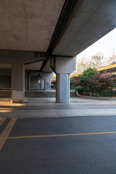 istock Concrete structure and asphalt road space under the overpass in the city 2178161185